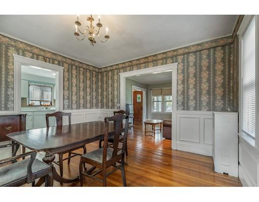 14 Woodbine Road Medford, MA 02155 - Photo 13 of 26 a view of a dining room with furniture window and wooden floor