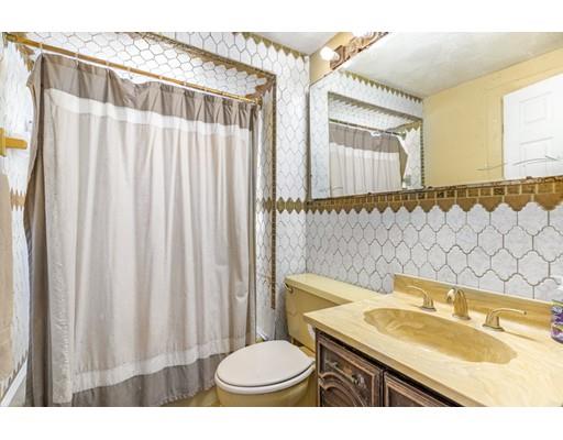 14 Woodbine Road Medford, MA 02155 - Photo 24 of 26 a bathroom with a sink toilet and shower