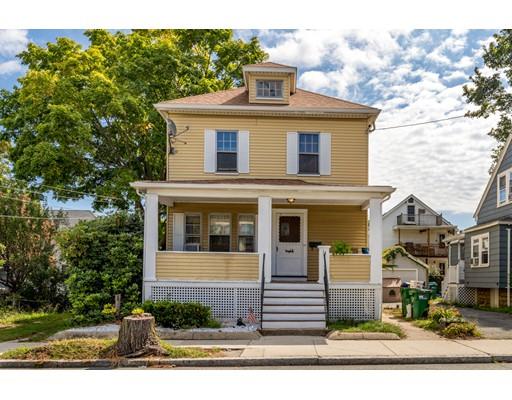 14 Woodbine Road Medford, MA 02155 - Photo 3 of 26 a front view of a house with a yard
