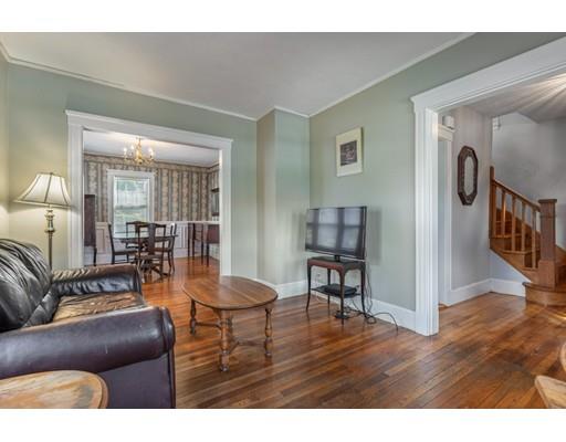 14 Woodbine Road Medford, MA 02155 - Photo 9 of 26 a living room with furniture and wooden floor