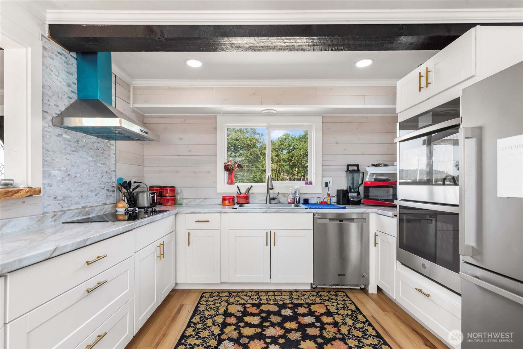 1855 South Bank Road Oakville, WA 98568 - Photo 13 of 22 a kitchen with sink cabinets and window