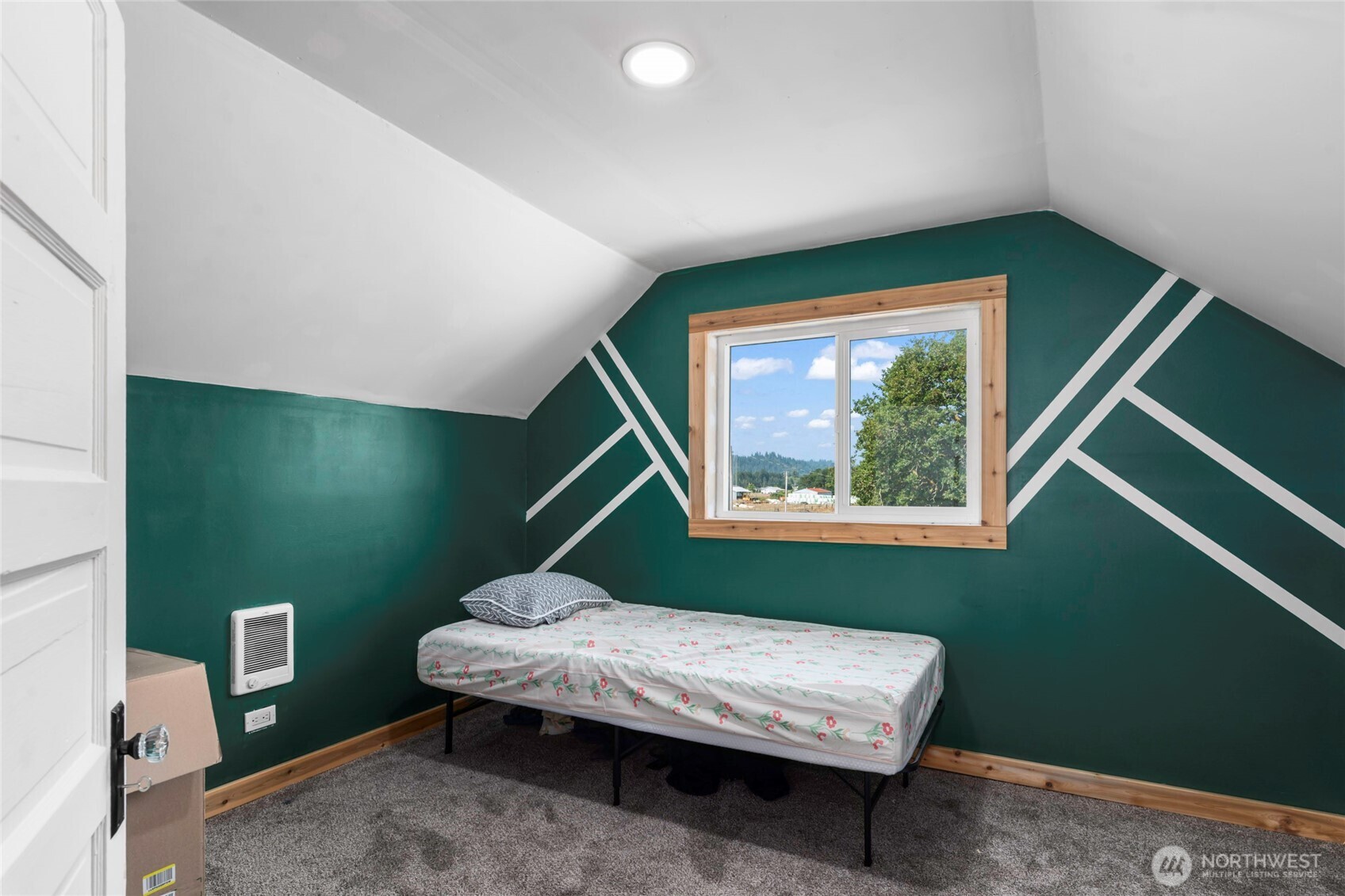 1855 South Bank Road Oakville, WA 98568 - Photo 17 of 22 a room with a window closet and rug