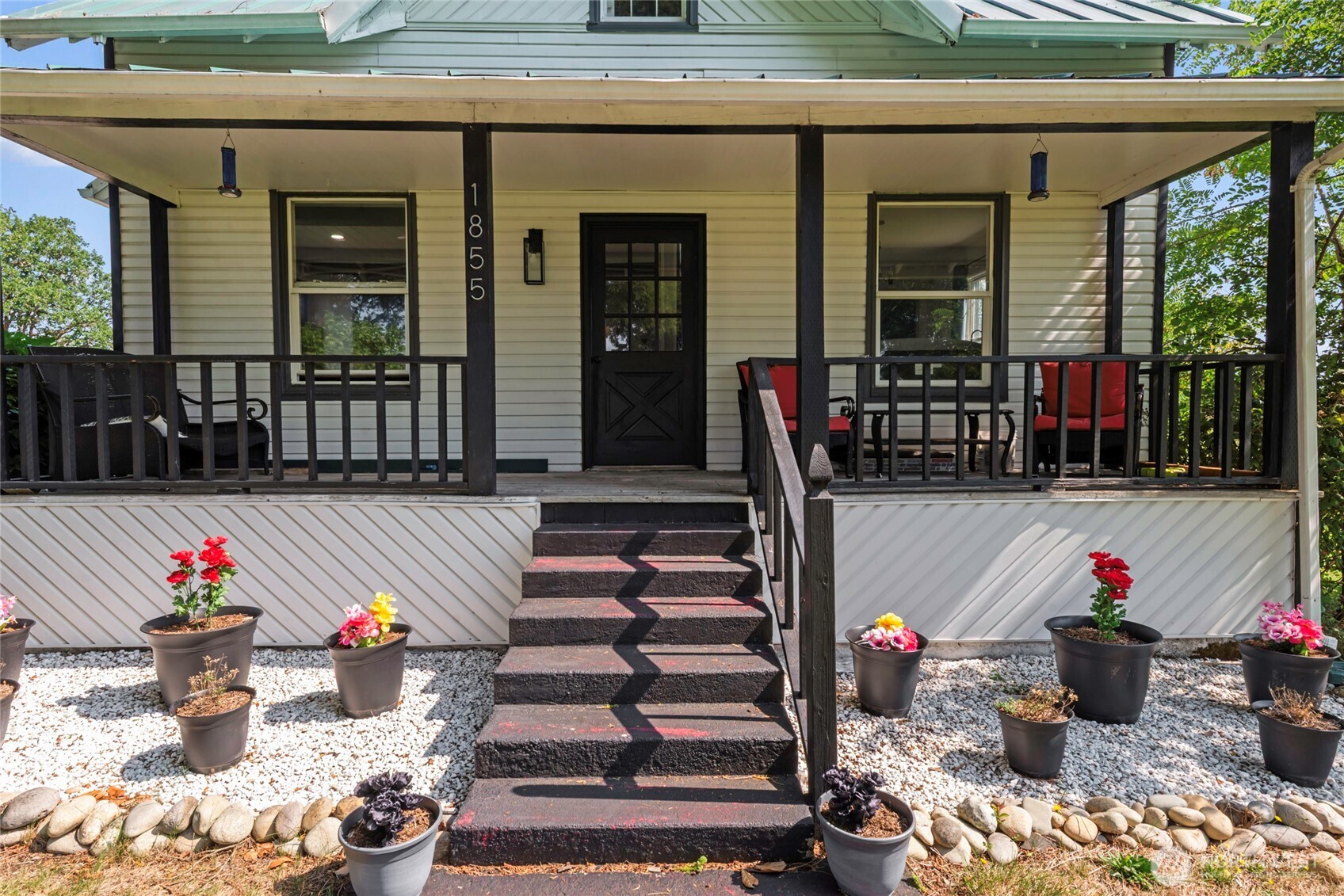 1855 South Bank Road Oakville, WA 98568 - Photo 3 of 22 a group of people sitting in front of a house