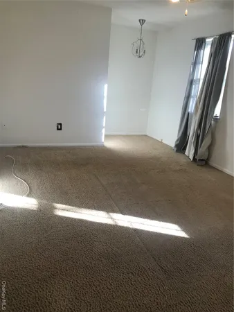 a view of empty room with window