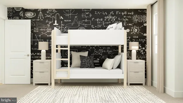 a view of a livingroom with wooden floor and a fireplace