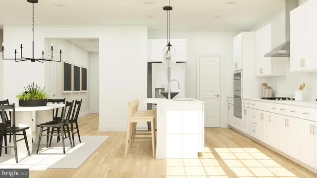 a living room with stainless steel appliances kitchen island granite countertop furniture and a fireplace