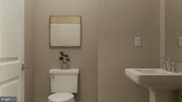 a bathroom with a sink and a toilet