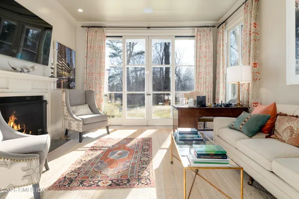 a bathroom with a shower sink and mirror