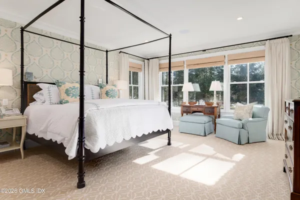 a view of a kitchen with a large window