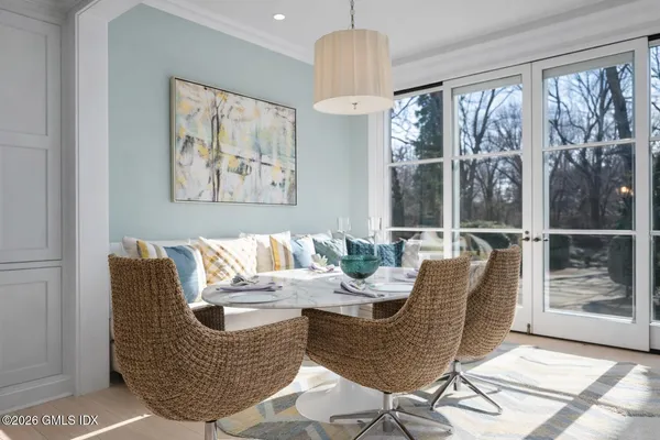 a kitchen with granite countertop a sink stove and cabinets
