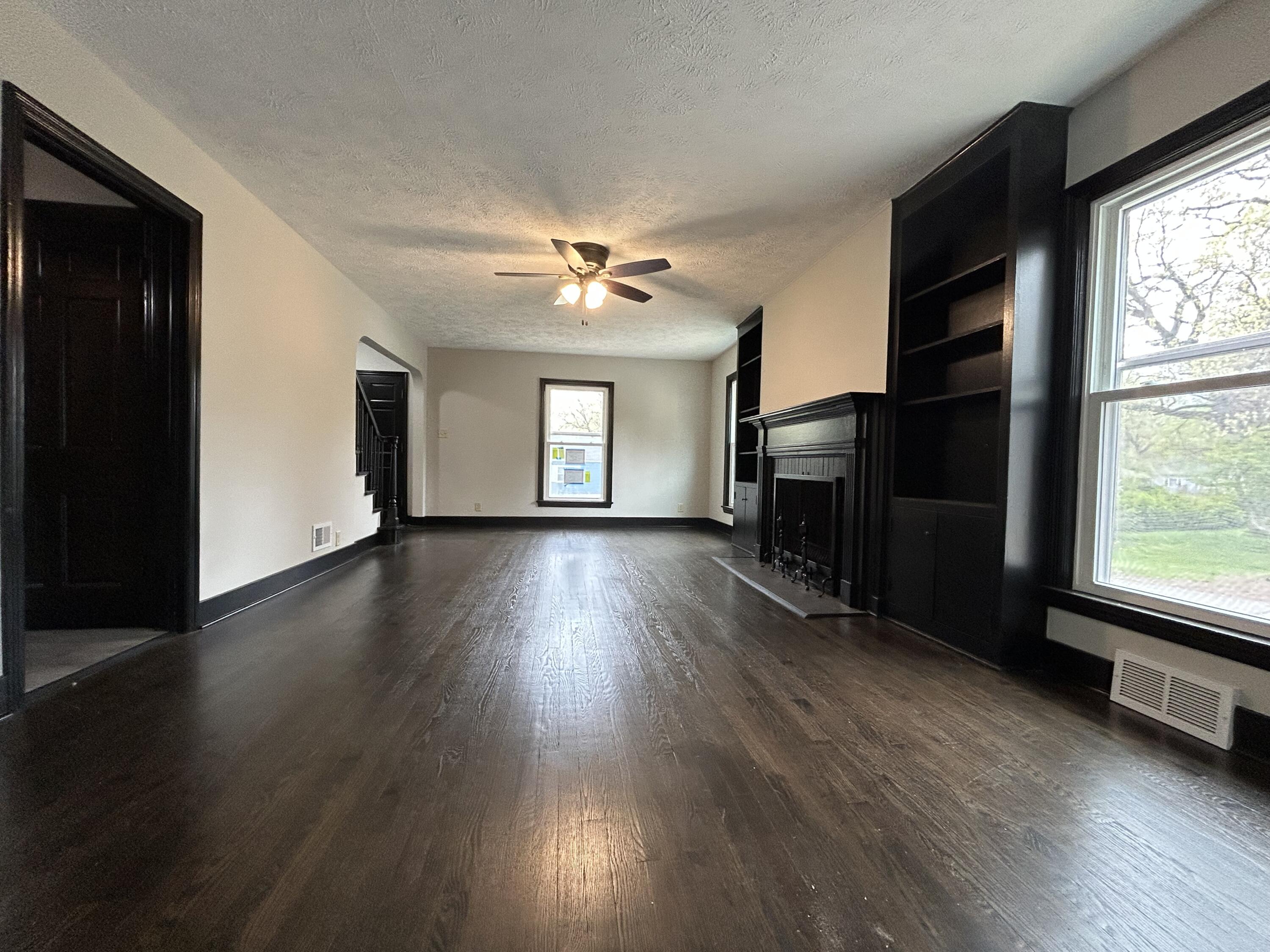 2264 Crest Road Gary, IN 46408 - Photo 14 of 86 wooden floor in an empty room with a window