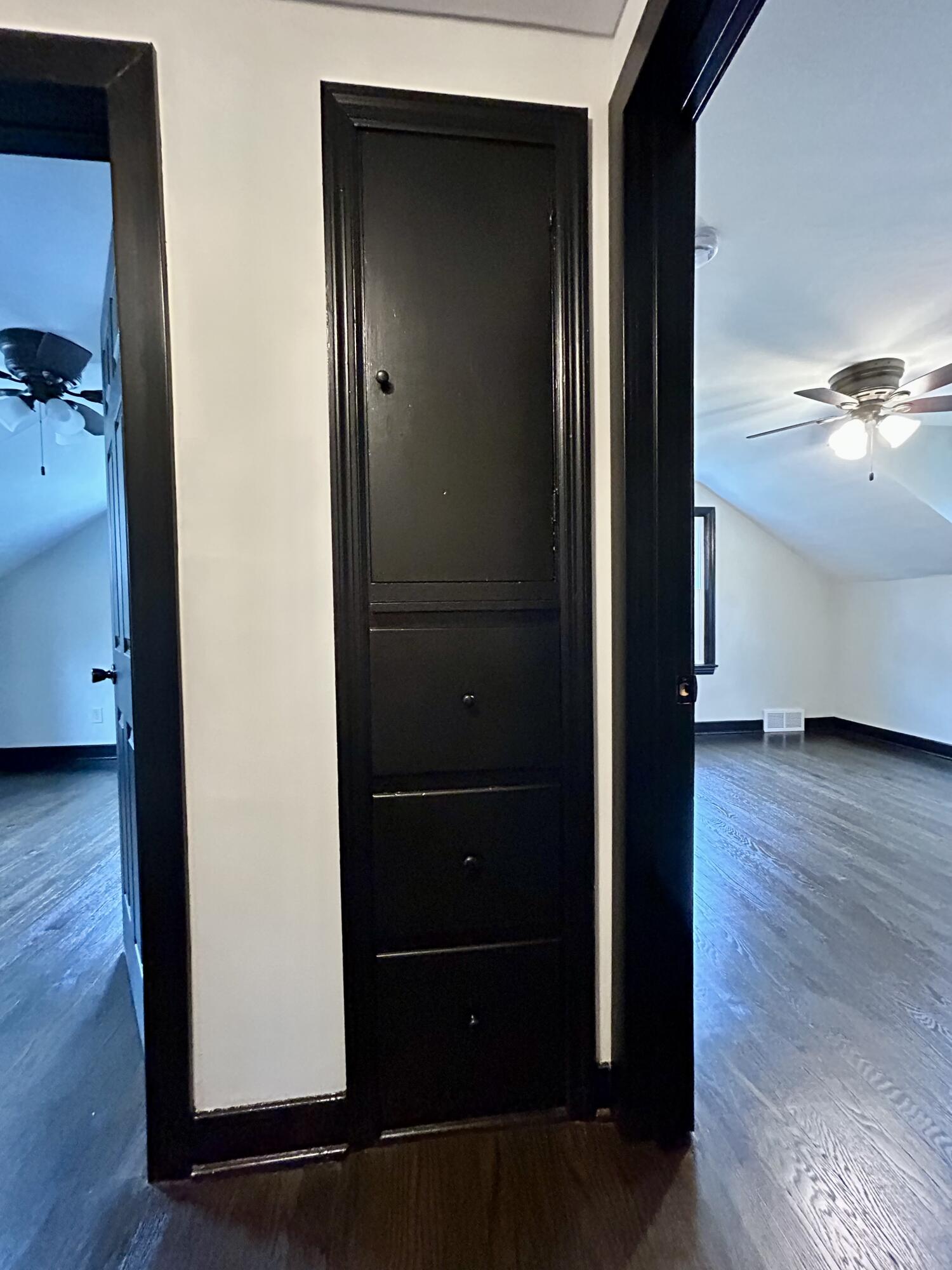 2264 Crest Road Gary, IN 46408 - Photo 47 of 86 an empty room with wooden floor closet and windows