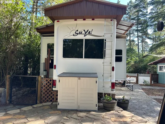 a front view of a house with garage