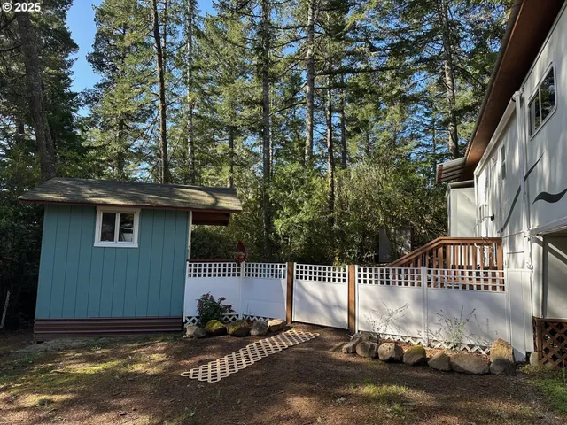 a view of backyard with deck