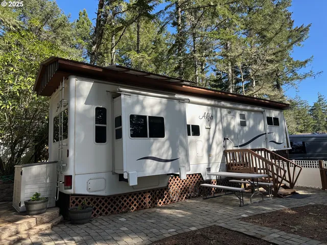 a front view of a house with patio
