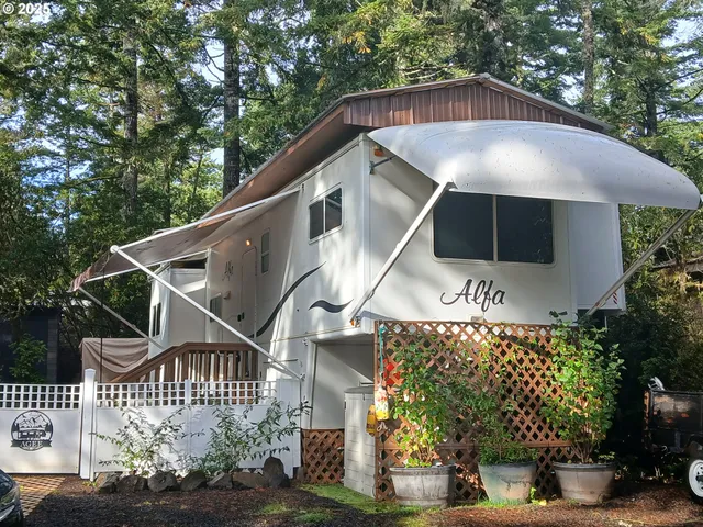 aerial view of a house with a yard