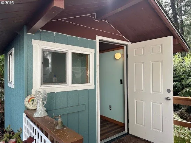 a front view of a house with outdoor shower