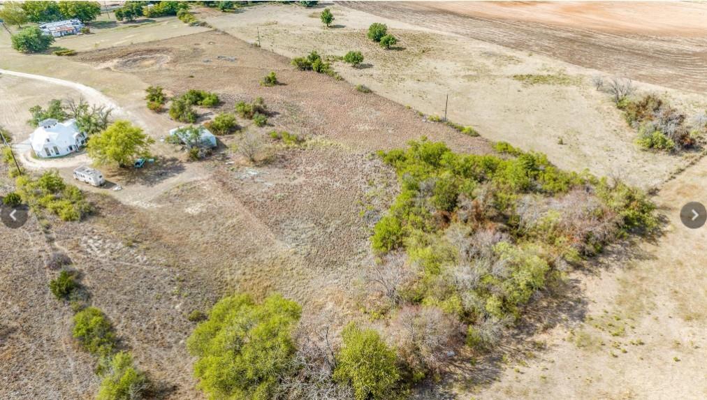 314 Windy Hill Lane Springtown, TX 76082 - Photo 1 of 15 Aerial view of sparsely populated area featuring property parcel outlined