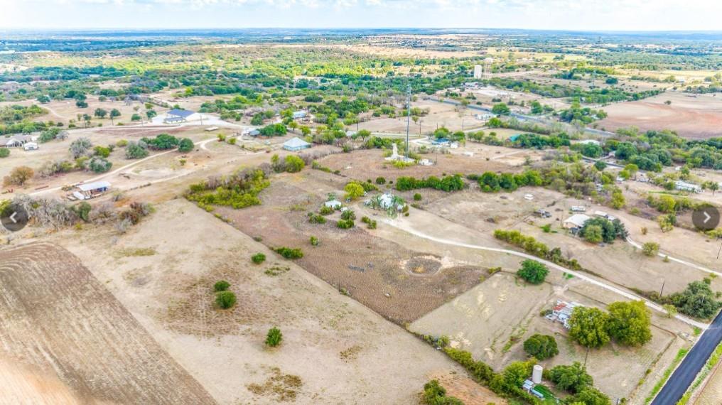 314 Windy Hill Lane Springtown, TX 76082 - Photo 3 of 15 Aerial view of property and surrounding area with rural landscape