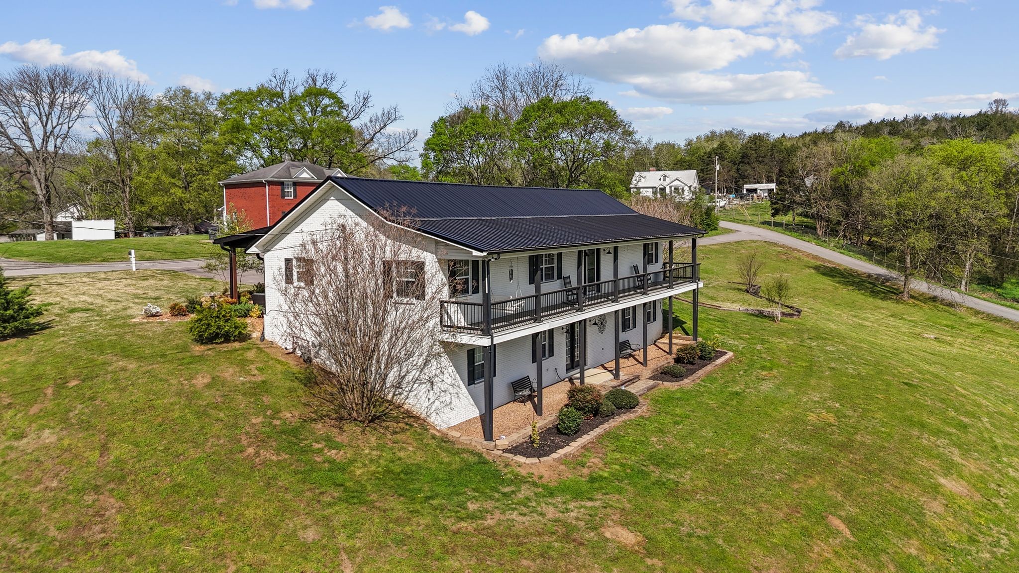 106 Edgehill Road Fayetteville, TN 37334 - Photo 3 of 47 a aerial view of residential houses with yard and trees