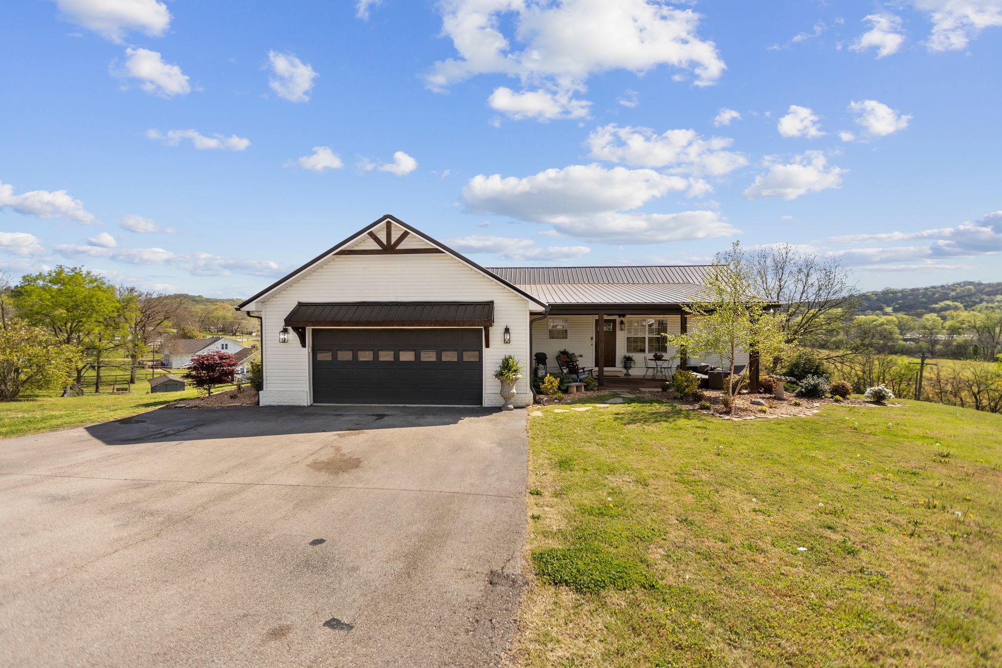106 Edgehill Road Fayetteville, TN 37334 - Photo 5 of 47 a view of a house with a yard and garage
