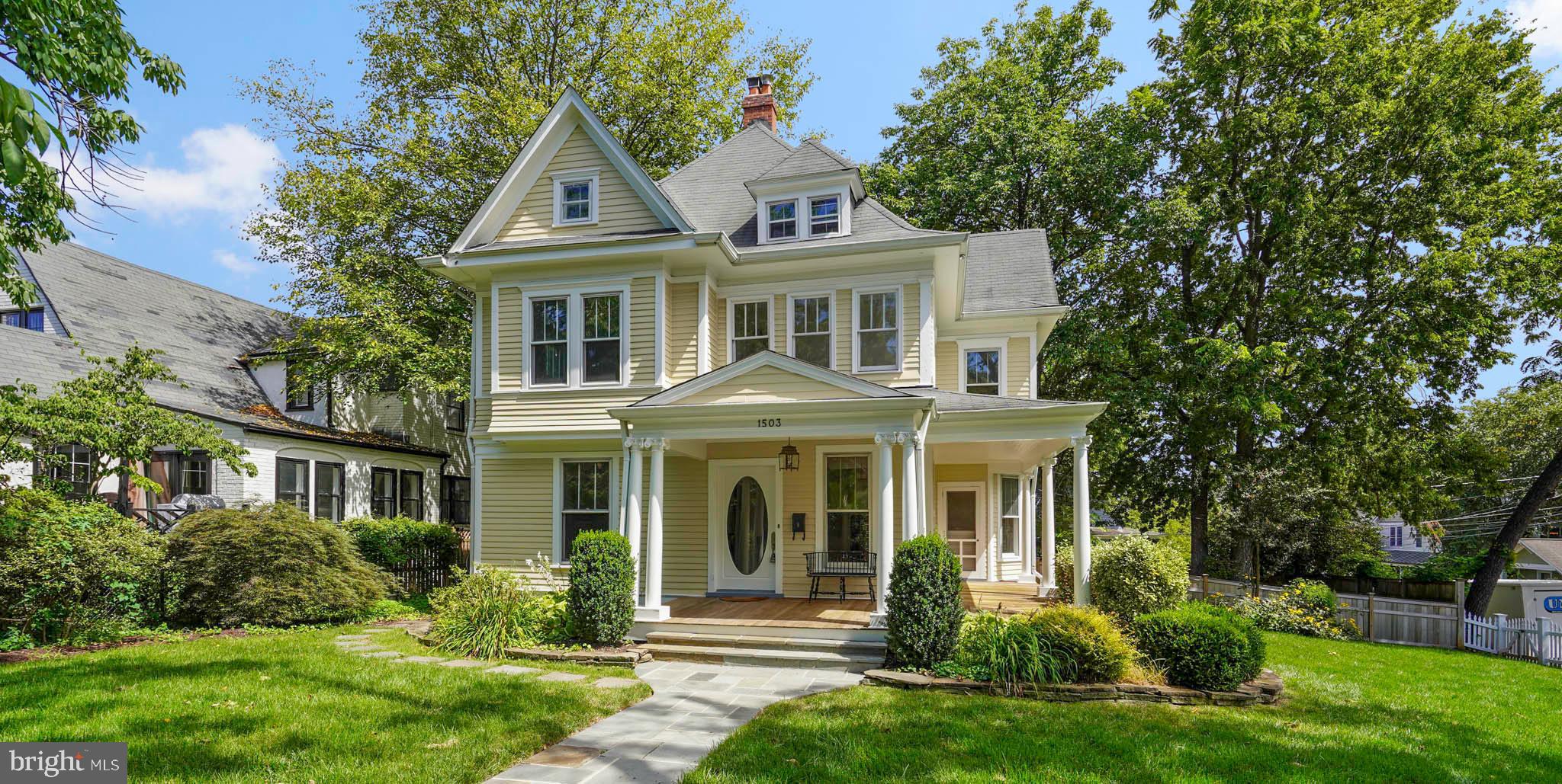 1503 Russell Road Alexandria, VA 22301 - Photo 1 of 39 front view of a house with a yard