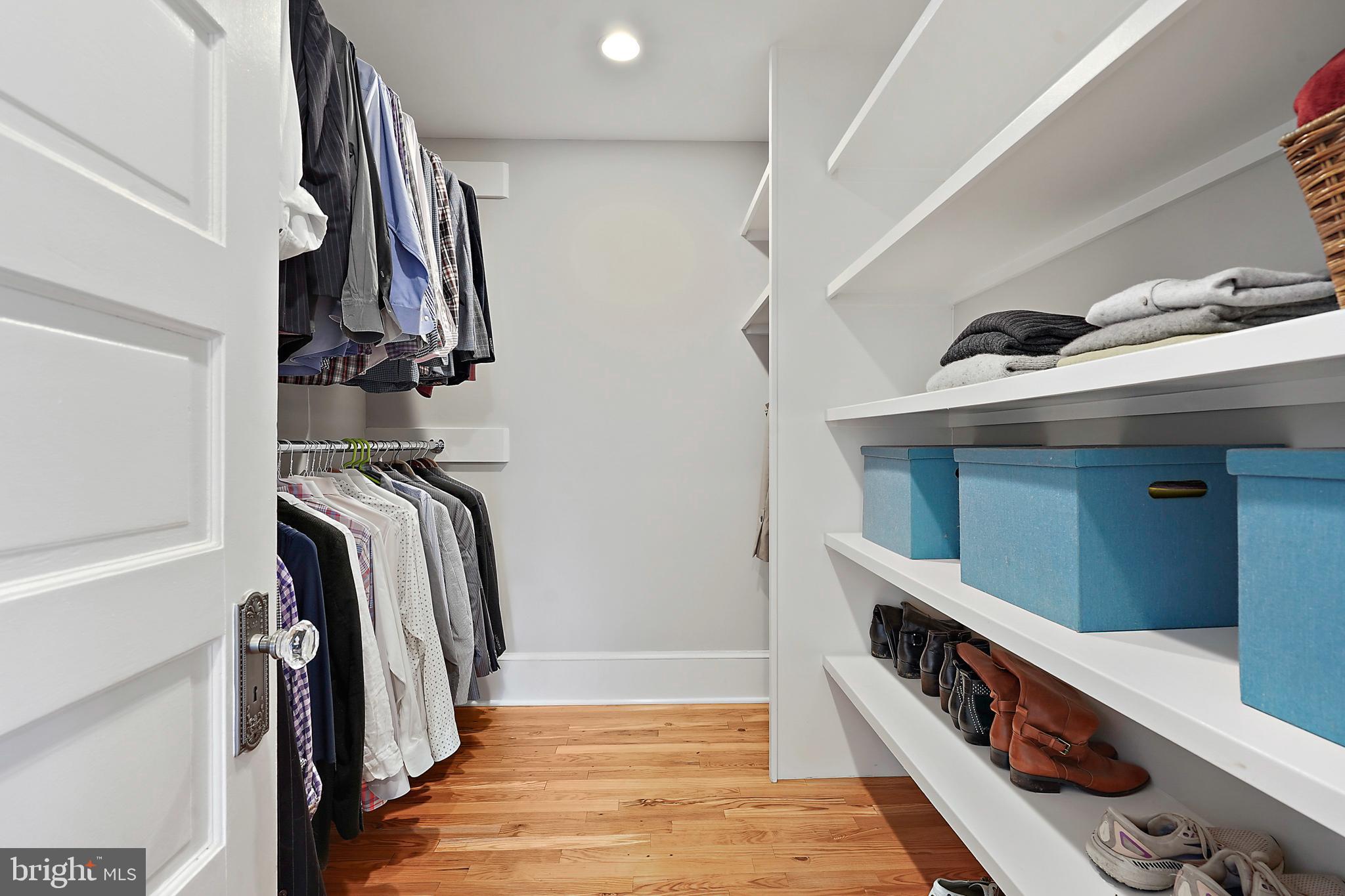1503 Russell Road Alexandria, VA 22301 - Photo 23 of 39 a view of walk in closet with clothes and shoes