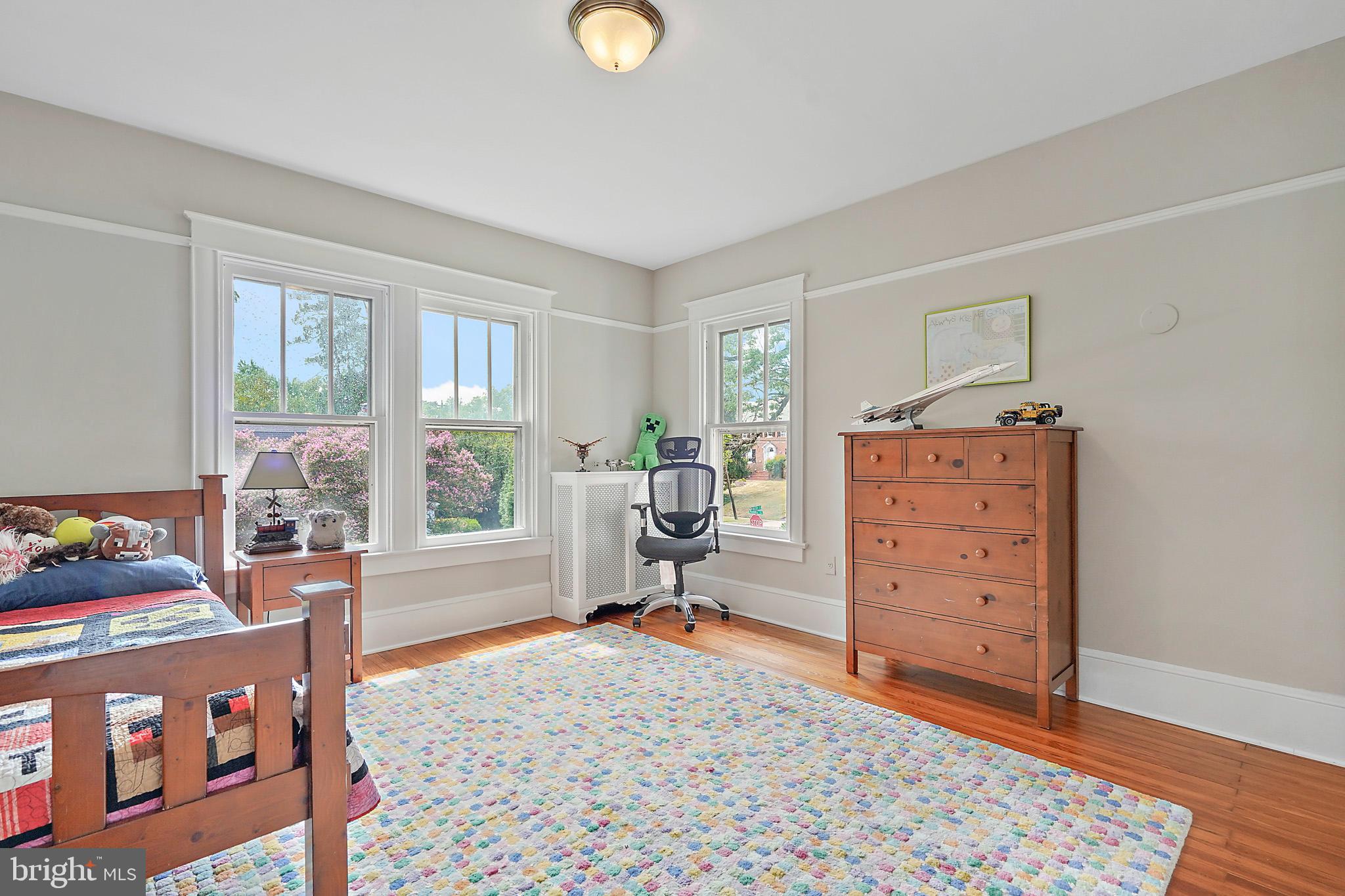 1503 Russell Road Alexandria, VA 22301 - Photo 27 of 39 a living room with furniture a window and a flat screen tv