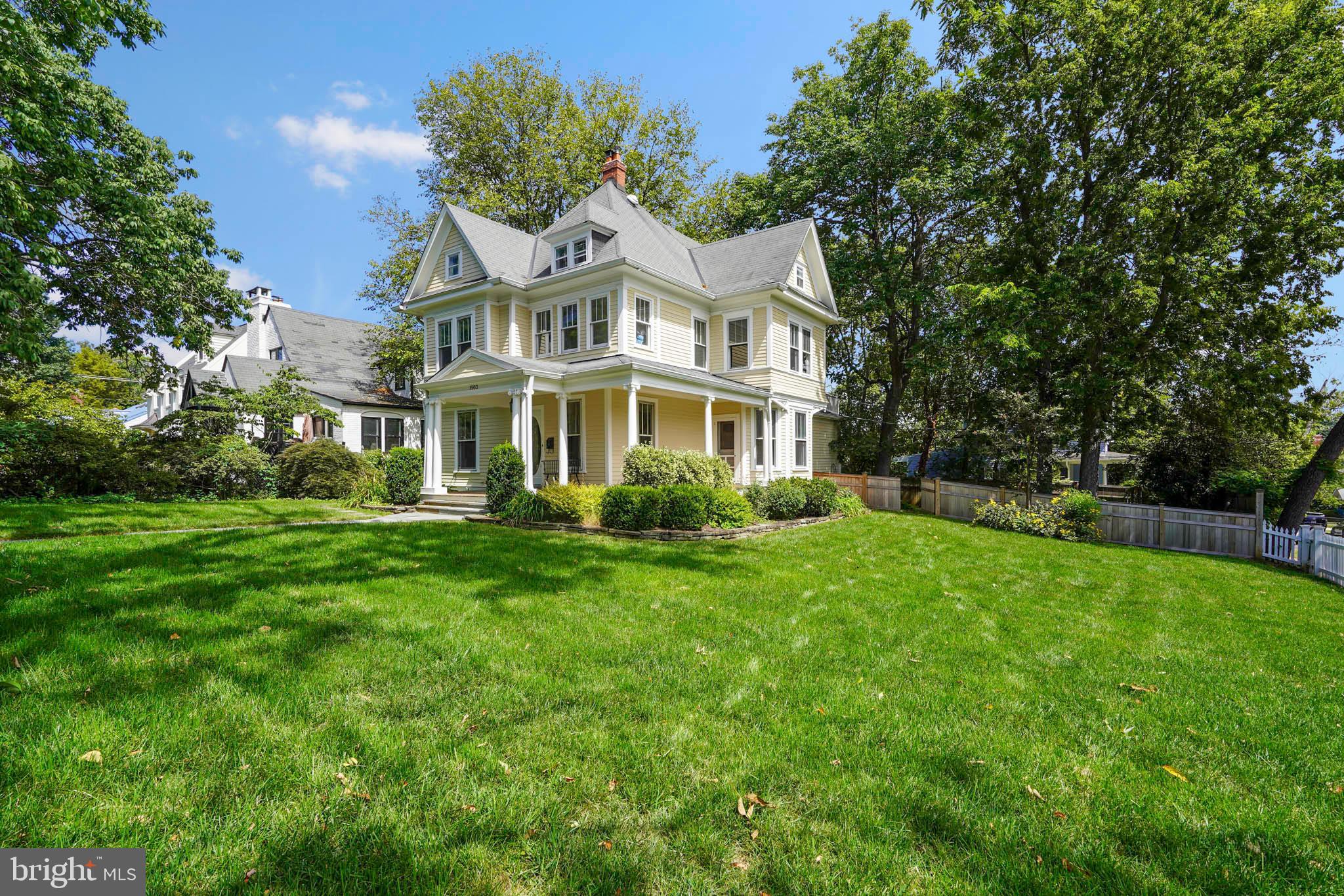 1503 Russell Road Alexandria, VA 22301 - Photo 3 of 39 a front view of a house with a yard