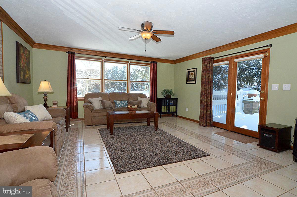 7900 Bennett Branch Road Mount Airy, MD 21771 - Photo 12 of 30 a living room with furniture and a large window