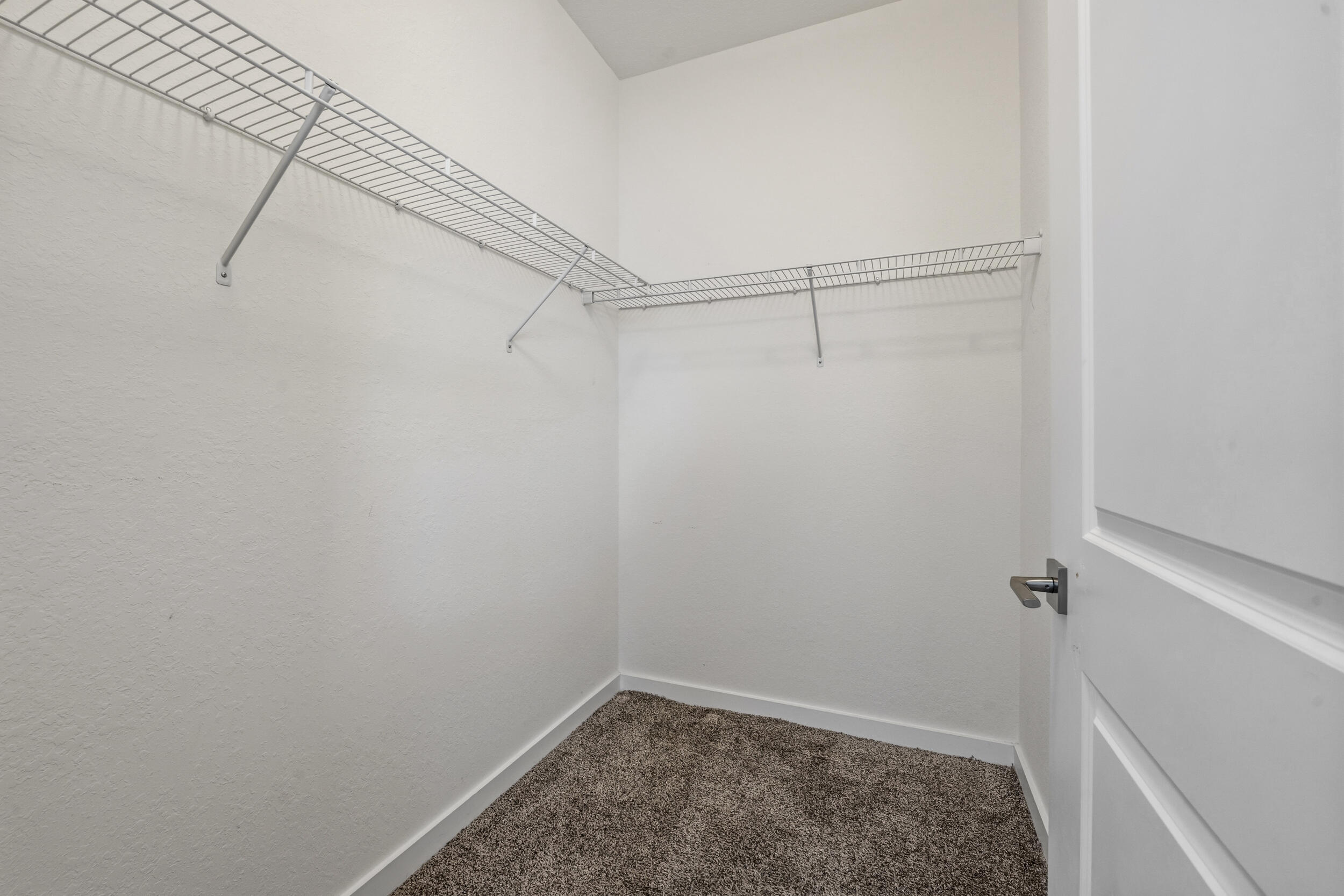 7461 Southwest Harbor Cove Drive Stuart, FL 34997 - Photo 21 of 30 a view of a room with racks on the wall