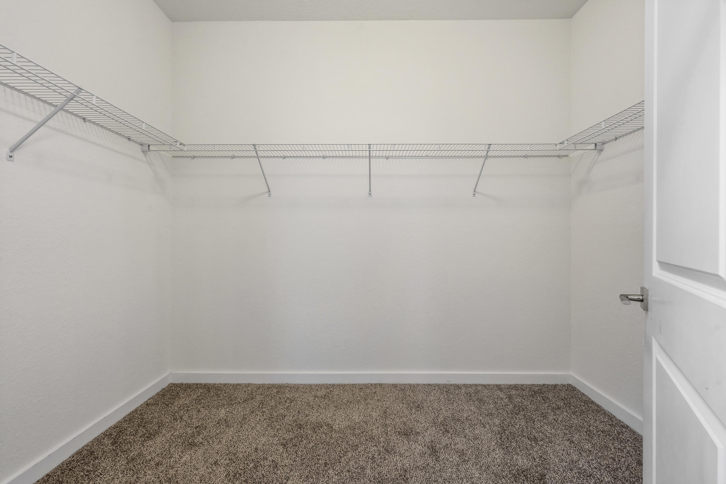 7461 Southwest Harbor Cove Drive Stuart, FL 34997 - Photo 22 of 30 a view of a room with racks on the wall