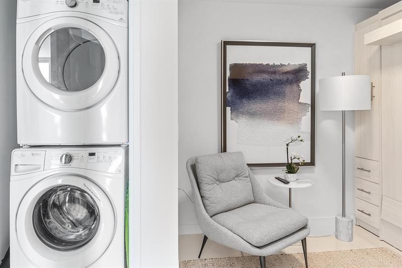 401 North Birch Road, Unit 1214 Fort Lauderdale, FL 33304 - Photo 11 of 47 a living room with furniture and a mirror