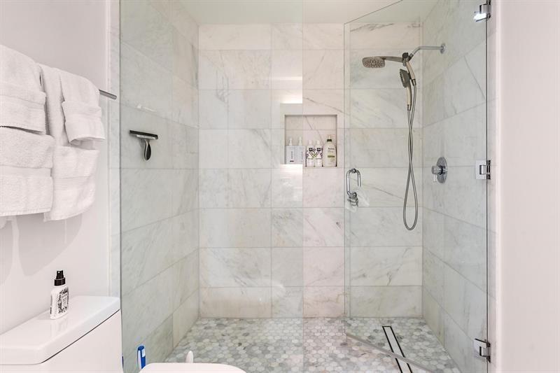 401 North Birch Road, Unit 1214 Fort Lauderdale, FL 33304 - Photo 24 of 47 a bathroom with a bathtub and shower