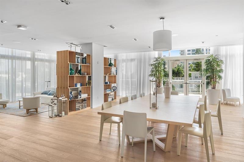 401 North Birch Road, Unit 1214 Fort Lauderdale, FL 33304 - Photo 33 of 47 a dining room with furniture window and wooden floor