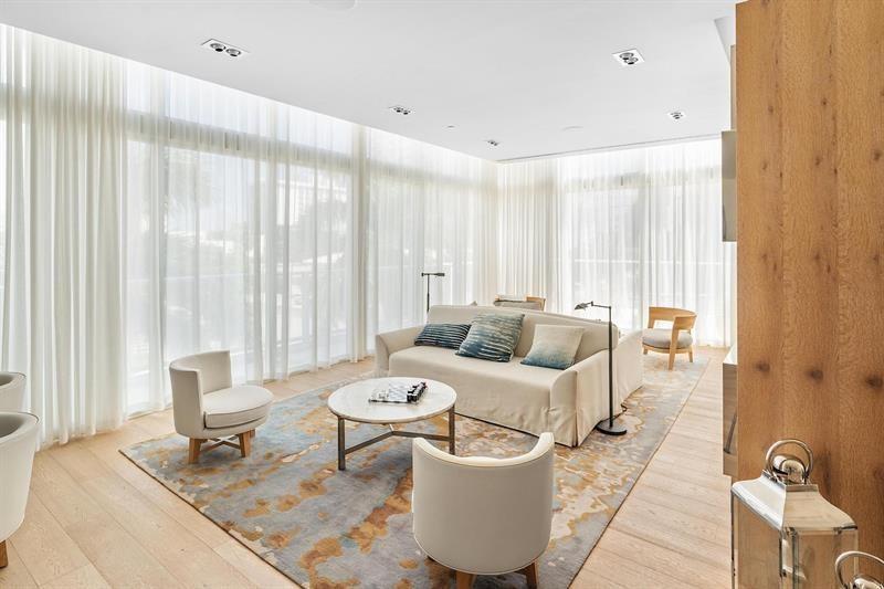 401 North Birch Road, Unit 1214 Fort Lauderdale, FL 33304 - Photo 35 of 47 a living room with furniture and a window