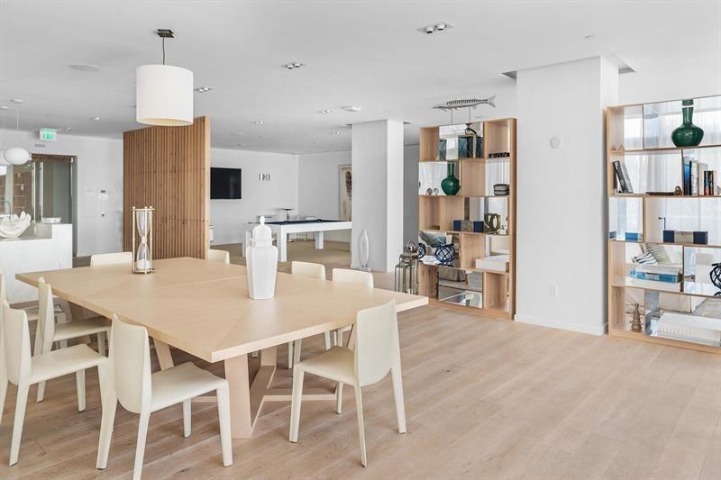 401 North Birch Road, Unit 1214 Fort Lauderdale, FL 33304 - Photo 36 of 47 a view of a dining room with furniture
