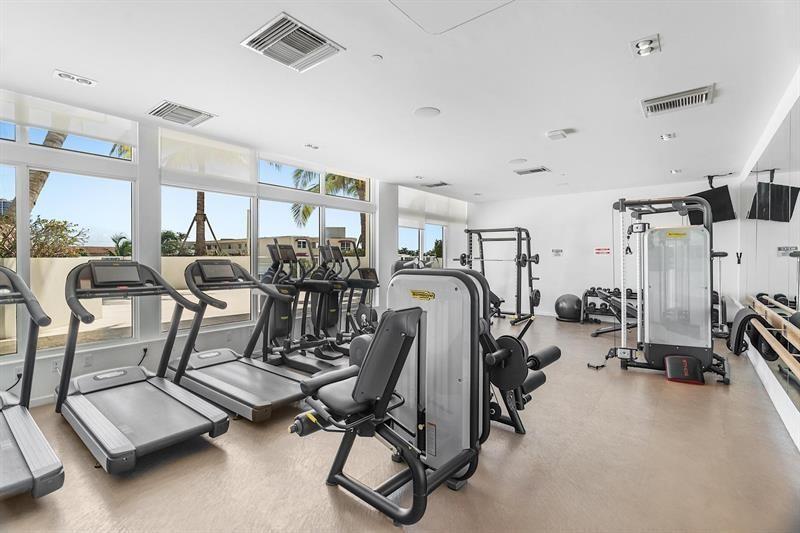 401 North Birch Road, Unit 1214 Fort Lauderdale, FL 33304 - Photo 44 of 47 a view of a room with gym equipment