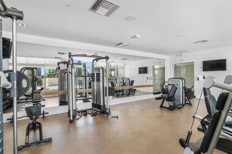 401 North Birch Road, Unit 1214 Fort Lauderdale, FL 33304 - Photo 46 of 47 a view of a room with gym equipment