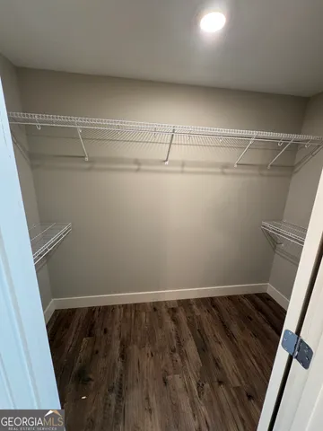 a view of a room with racks on the wall