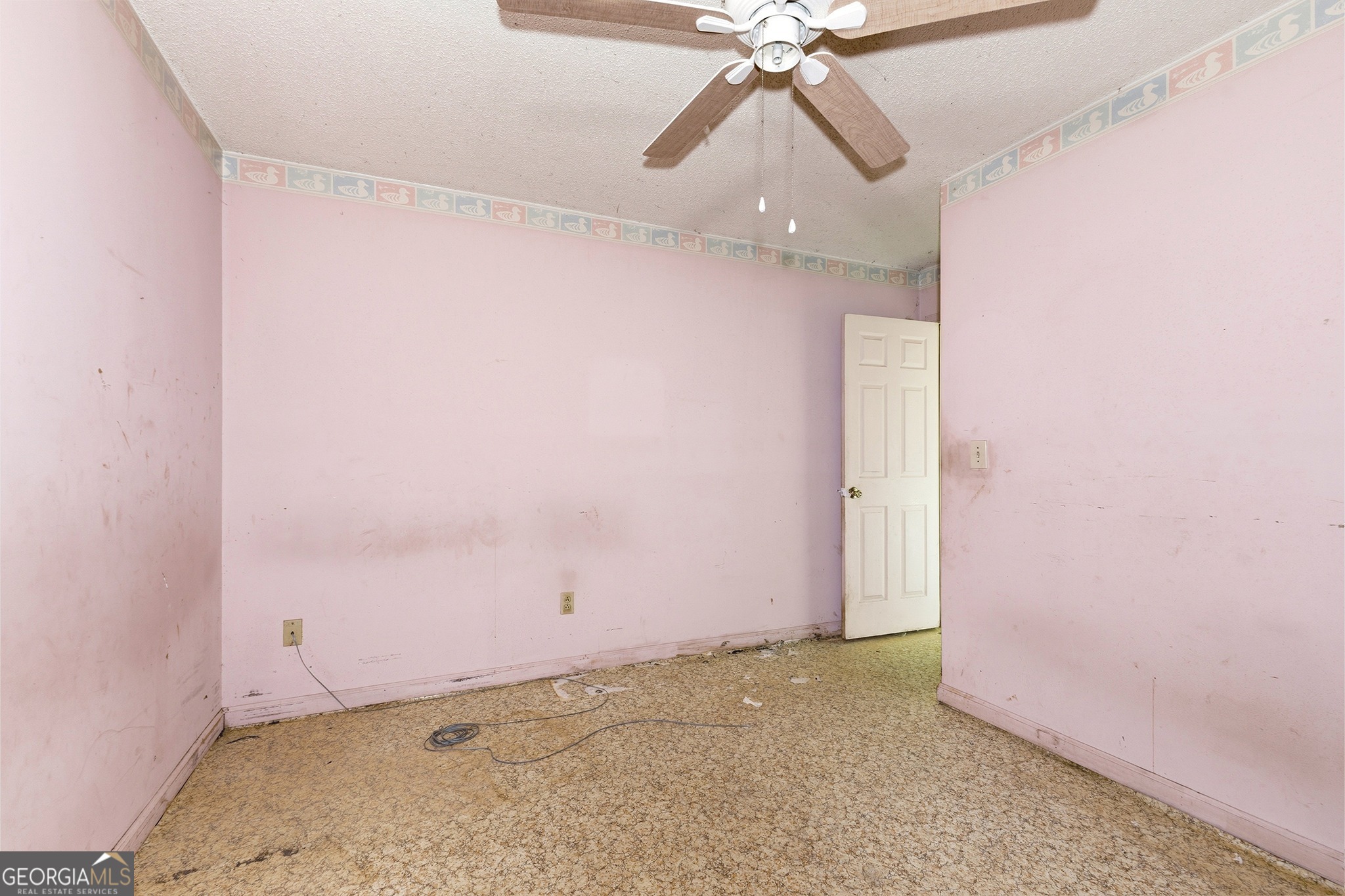 342 North Lake Drive Perry, GA 31069 - Photo 18 of 22 an empty room with a fan & a window