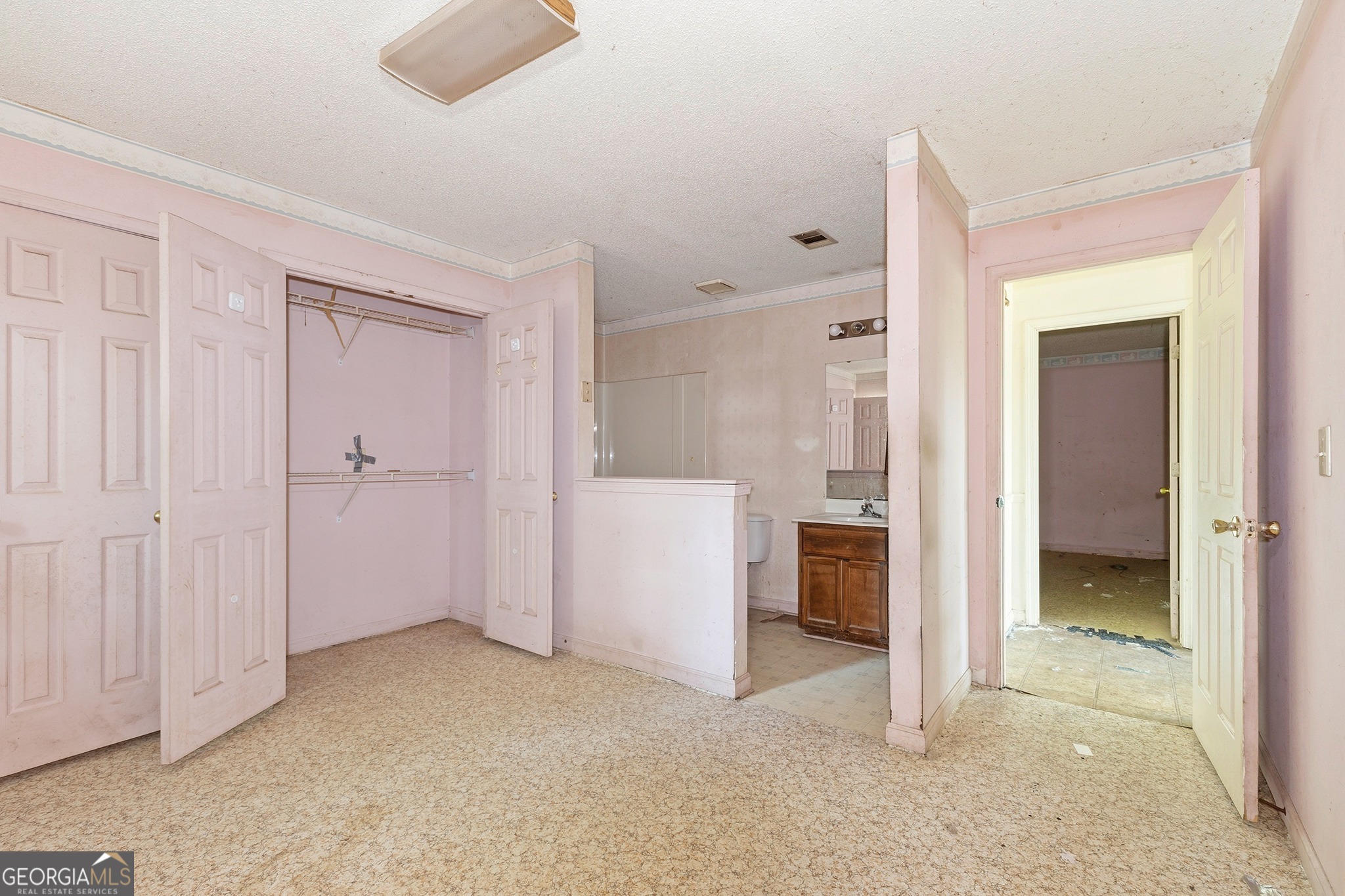 342 North Lake Drive Perry, GA 31069 - Photo 21 of 22 an empty room with a bathroom and a sink