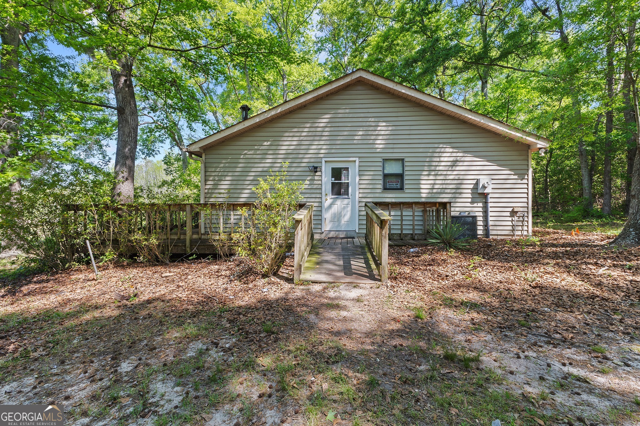 342 North Lake Drive Perry, GA 31069 - Photo 3 of 22 a view of an house with backyard space and garden