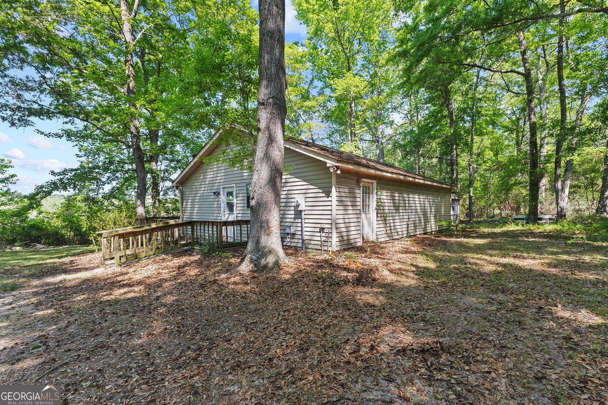 342 North Lake Drive Perry, GA 31069 - Photo 4 of 22 a view of a house with a yard and large tree