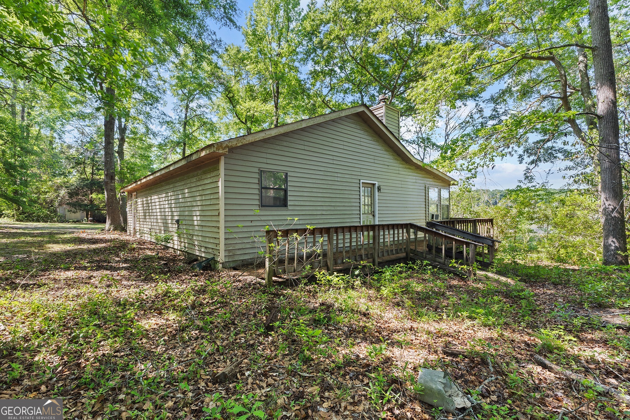 342 North Lake Drive Perry, GA 31069 - Photo 5 of 22 a backyard of a house with lots of green space
