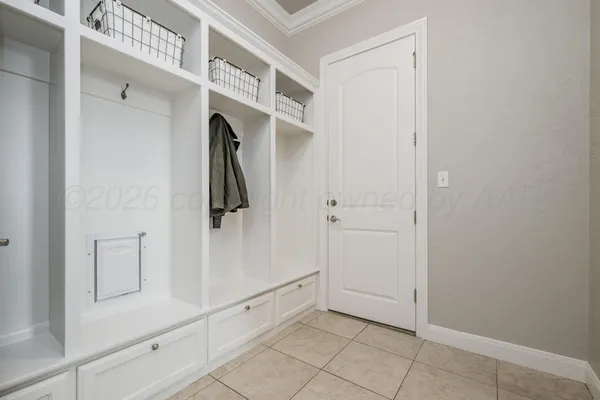 a kitchen with granite countertop a sink and cabinets