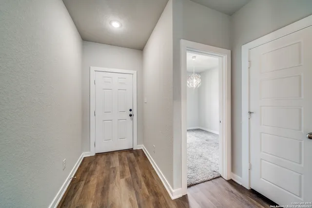a workspace with furniture and a bookshelf