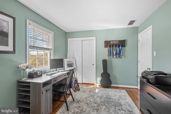 a workspace with furniture and window