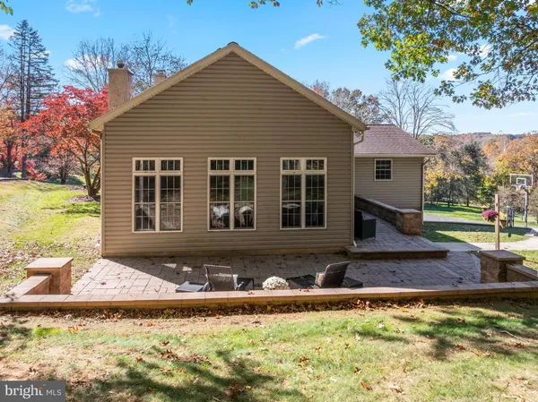 a front view of a house with swimming pool