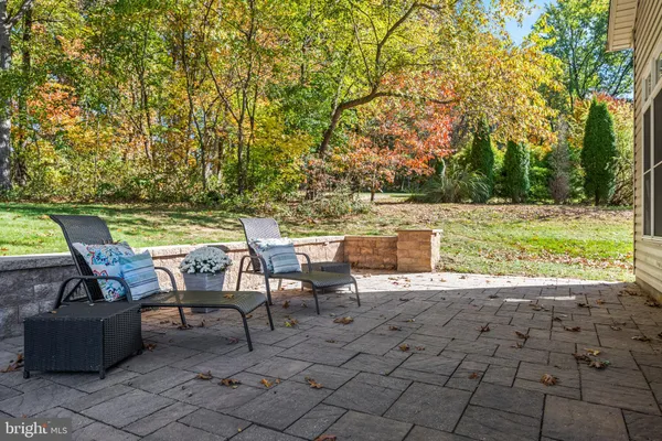 an aerial view of a house with outdoor space